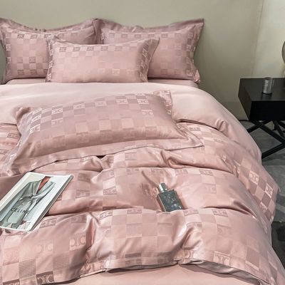 Sette di biancheria da letto di lusso a modello solido per biancheria da letto leggera di lusso satinata Jacquard a 4 pezzi