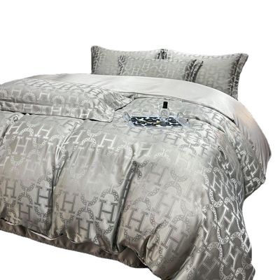 40 Tissu Count Light Luxury Satin Jacquard Set di biancheria da letto da quattro pezzi per i mercati di campagna
