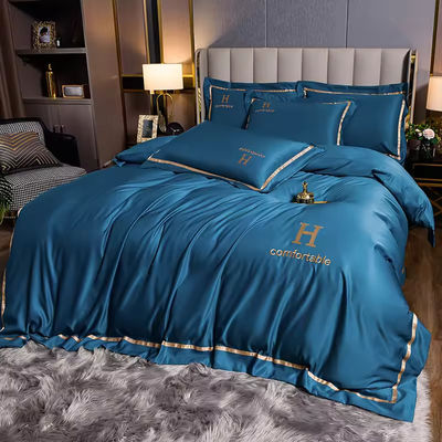 Home Poliestere lussuoso ricamato biancheria da letto di seta da lavaggio con copertura di copriletto a colori solidi