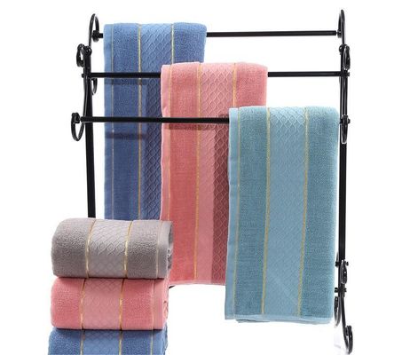 Asciugamani di cotone 32S ad alto assorbimento con bordo dorato e modello a pila di taglio a colori solidi