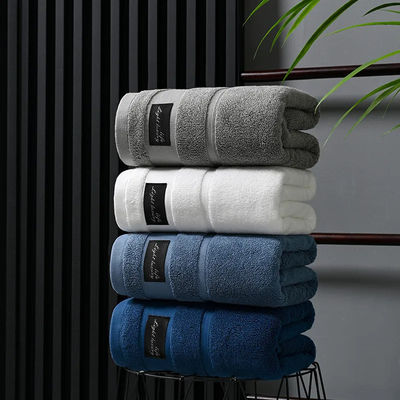 Set di asciugamani per hotel di lusso in cotone puro con disegno a strisce spesse e Jacquard