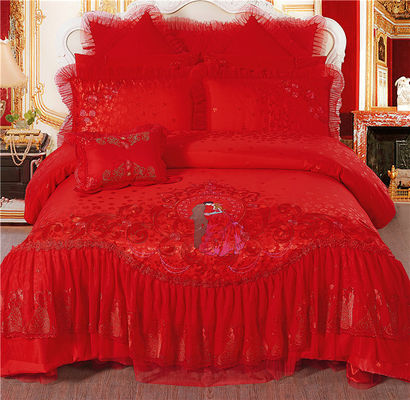 Set di biancheria da letto da sposa di lusso in quattro pezzi con copriletto stampato e lenzuola di cotone al 100%