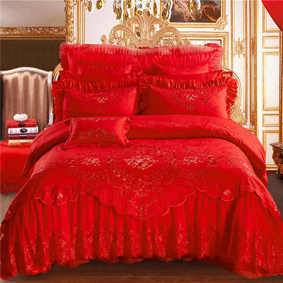 Set di biancheria da letto da sposa di lusso in quattro pezzi con copriletto stampato e lenzuola di cotone al 100%