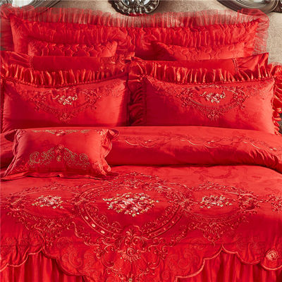 Set di biancheria da letto da sposa di lusso in quattro pezzi con copriletto stampato e lenzuola di cotone al 100%