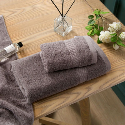 Hotel 5 stelle 100% cotone Spa faccia mani Set di asciugamani da bagno con logo personalizzato e colore solido