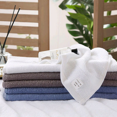 Hotel 5 stelle 100% cotone Spa faccia mani Set di asciugamani da bagno con logo personalizzato e colore solido